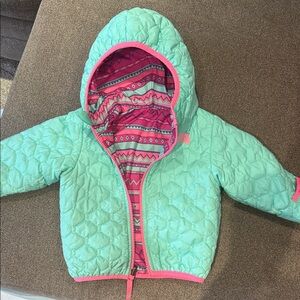 Mint green North Face quilted puffer  Jacket with Pink reservable option.